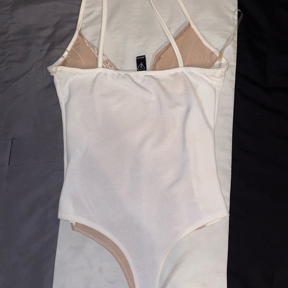 White and tan lace body suit